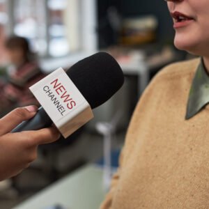 Close-up of woman having an interview with journalist in office
